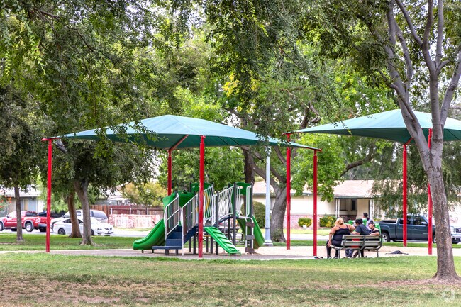Kids lead adventures on Wilson Park's playground near Benton Park.