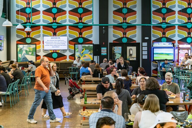 Friends and family come together for Trivia Night at Reslin Beer Co. in the Strip District.