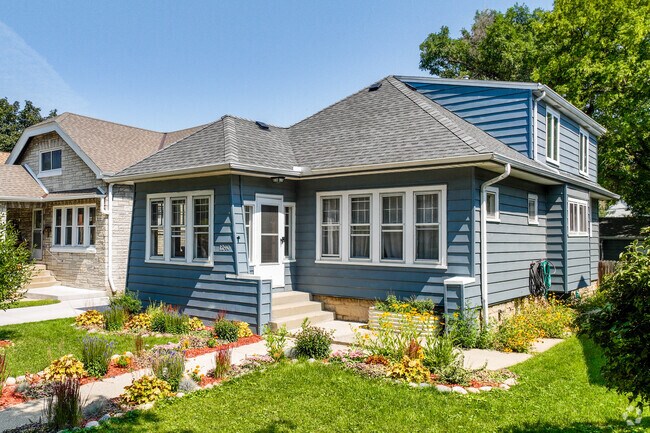 A cozy bungalow stands proudly on a corner in Fair Park.
