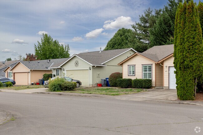 Contemporary homes line Four Corners streets near East Village Park.