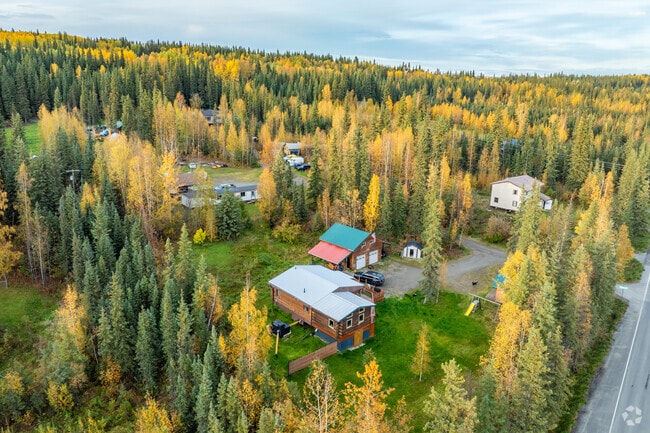 Homes in Ester are nestled in the hills among mature trees.