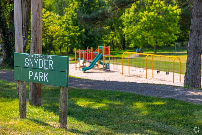 Walk the paths, play some basketball, or enjoy nature at Snyder Park, near Violet Hill.