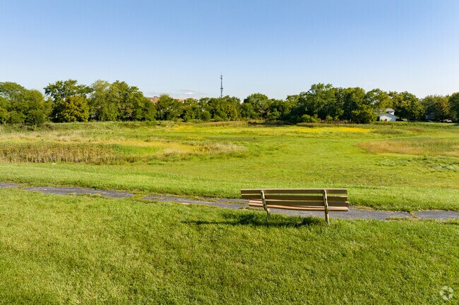 Stone Hollow Park in Stonebridge Hazel Crest has a walking trail and benches to sit and enjoy.