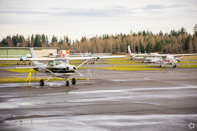 Private planes await their pilots at Thun Field in South Hill.