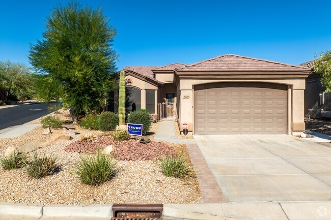 Stucco facades and tile roofs are popular in single family homes in Laughlin Ranch.
