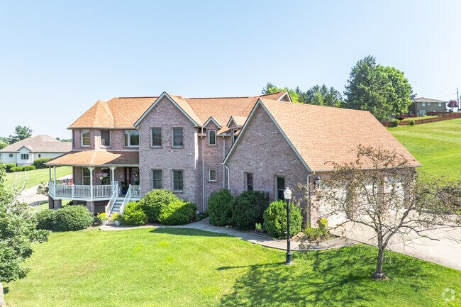 New Traditional construction can be found in the Saint Clairsville with multiple garages.