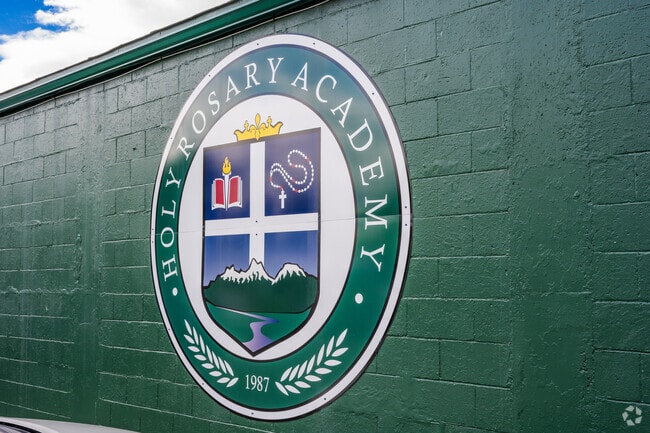 Holy Rosary Academy's logo.