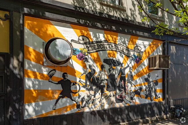 A mural depicting local community members in the Mount Scott-Arleta Neighborhood.