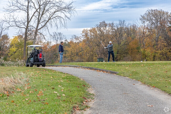 A Washington Township resident takes a swing at The Orchards Golf Club.