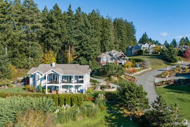 Multilevel houses sit on hillsides in Kopachuck Ridge/Horsehead Bay.