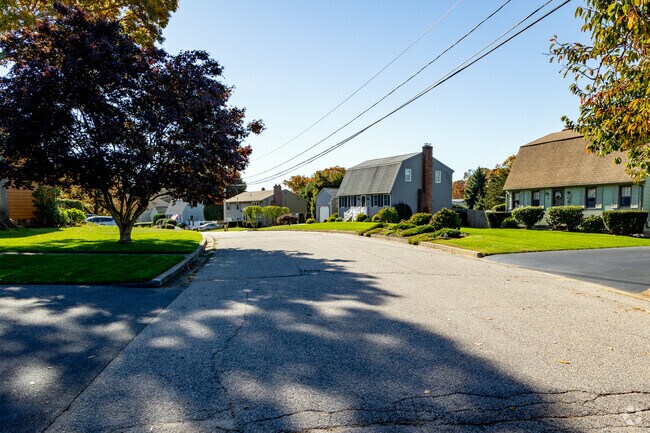 A row of homes adorn a peaceful neighborhood in Crompton.
