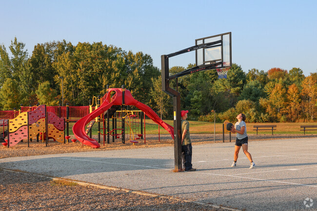 Pond Road families hit the nearby basketball courts at the elementary school after dinner.