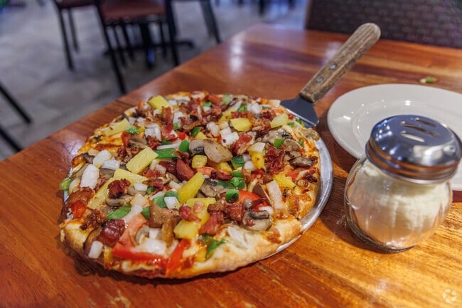 Squire's Restaurant boasts the best atmosphere and cuisine, outshining all nearby Italian spots.