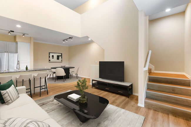 Renovated Package I living and dining room with hard surface flooring