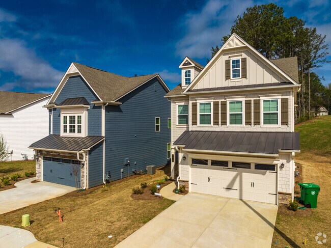 Traditional styled newer homes sit near Tobie Grant Park in Scottdale.