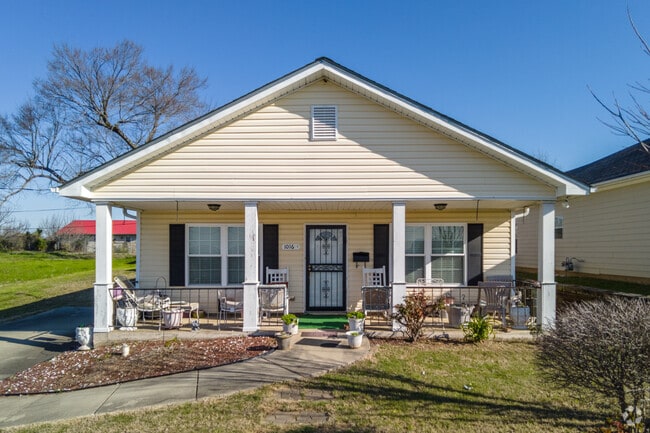 Admire a craftsman cottage as you drive the streets of North Pratt.