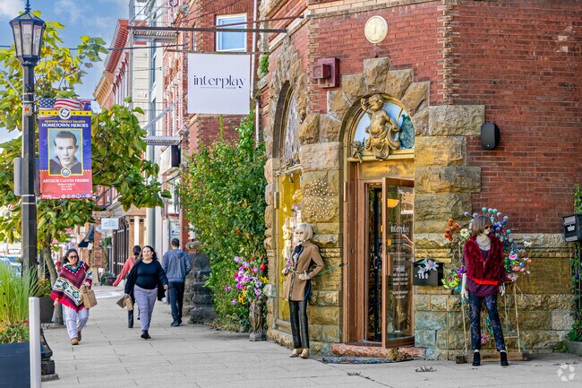 Experience the bustling shopping hub on Spring St, where all your retail desires are catered to.