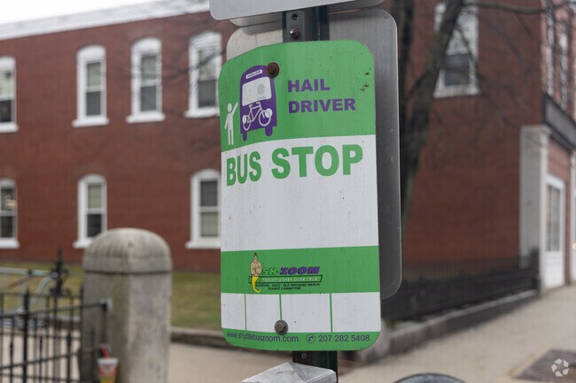 There are bus stops on Main Street in Downtown Biddeford.