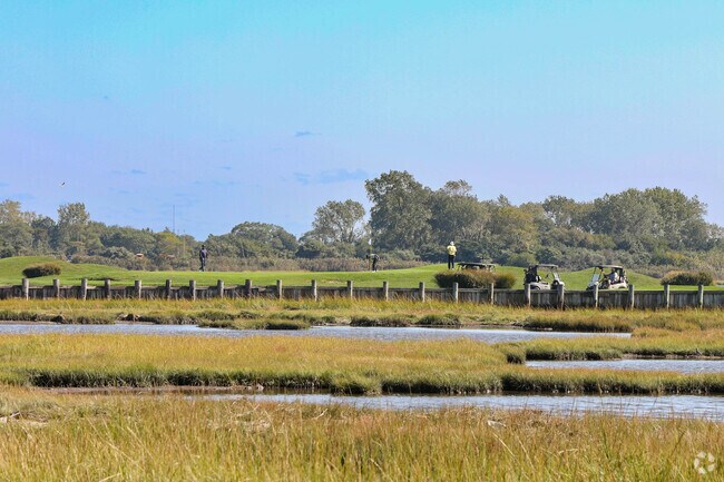 The wind off the water can make playing at golf at The Golf Club at Middle Bay challenging.