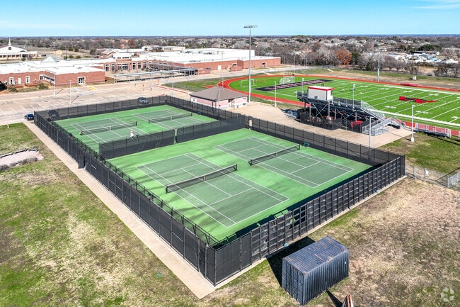 The students at Willow Springs Middle School can learn to play tennis.