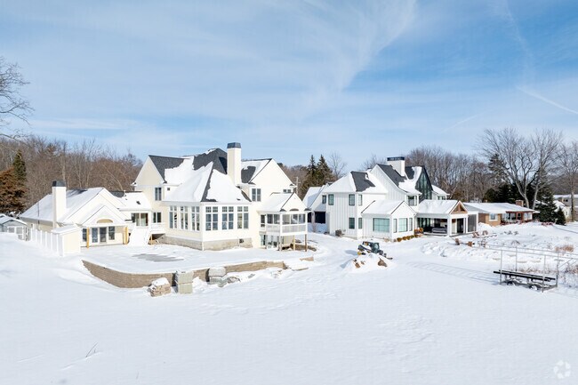 Luxury homes near Bear Lake brighten winter living in Laketon Township.