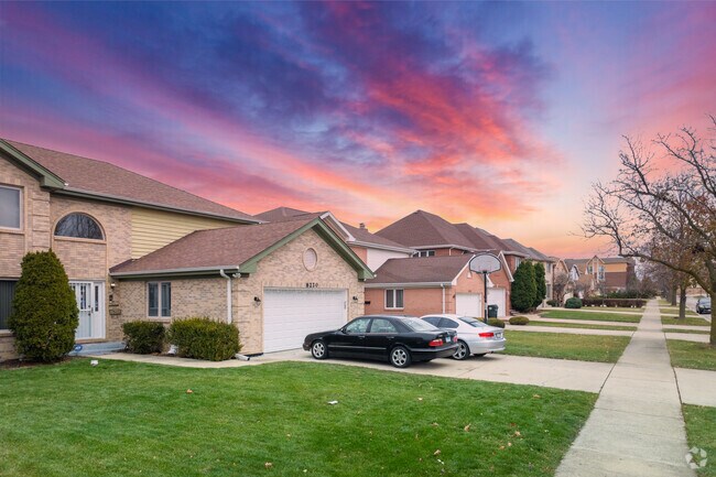 Ballard Terrace features turnkey homes with driveways and front lawns.