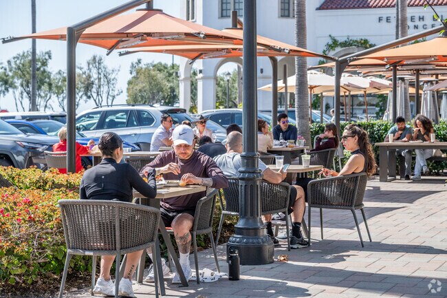 The Crystal Cove Shopping Center offers plenty of dining options and seating.