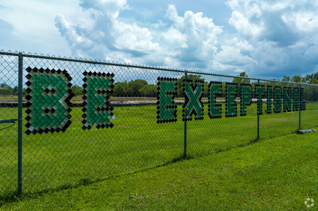 Fence sign reading 