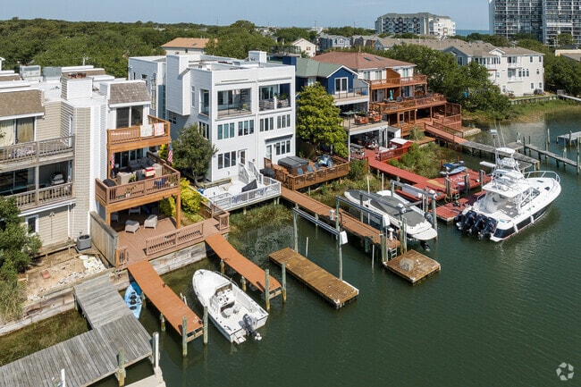 Personal docks and large boats line the shore in the Ocean Park neighborhood of Virginia Beach.