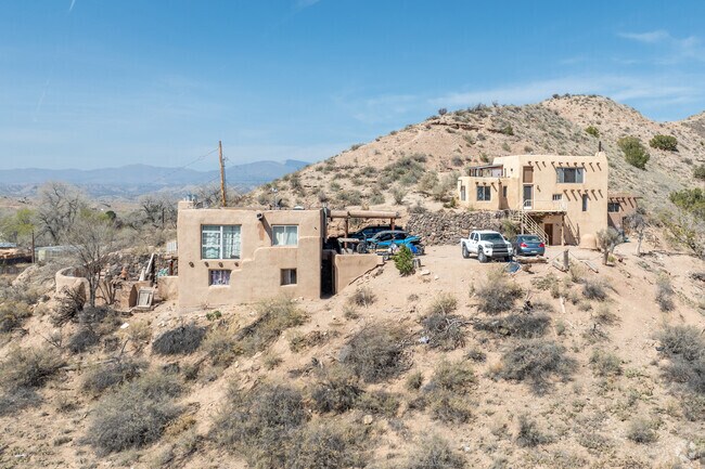 Pueblo-style homes fit into the rural landscape of Cuartelez.