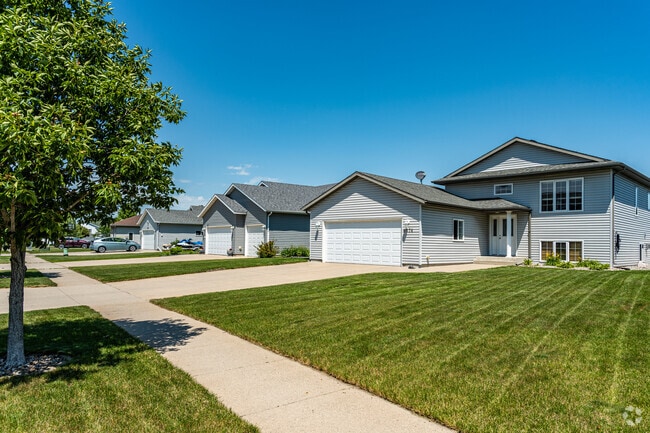 Charming rows of single family homes in Woodhaven, Fargo, blend community charm with comfort.