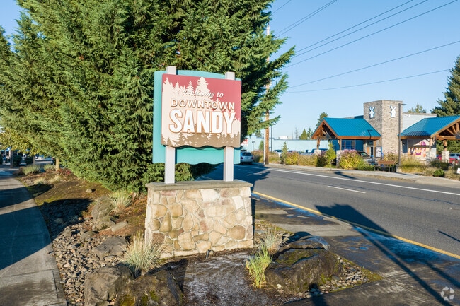 A sign on Hwy 26 welcomes you to Sandy.