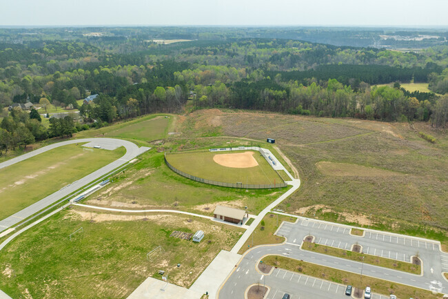 Neuse River Middle School features a baseball field and track area for its students.