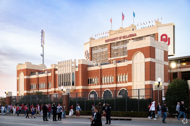 The University of Oklahoma, which began with 100 students, currently enrolls around 22,000.