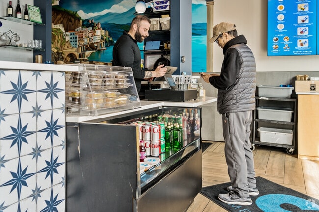 Engaging service while ordering at Capo's eatery in Carlmont.