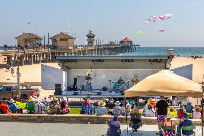 Come join us for Surfin' Sundays on the beach At Huntington Beach Pier Plaza.