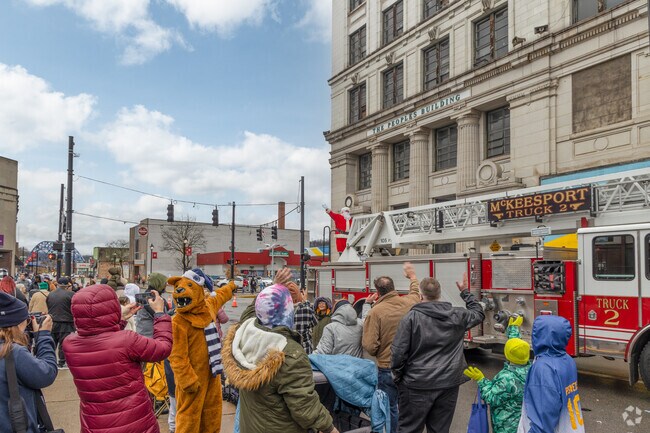 The big guy himself is at the end of the Salute To Santa Parade in McKeesport.