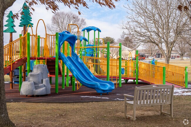 Families head to Chesterfield Park to enjoy the colorful playground.