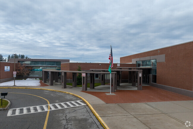 Meadow Ridge Elementary features a small brick building for its students.