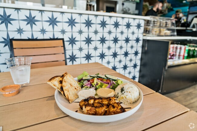 Savor the flavors with Capo's chicken kebab plate in Carlmont