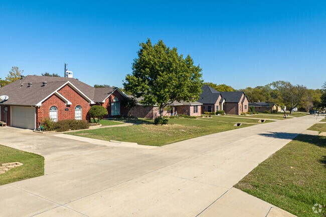 Traditional brick homes in Lakewood Village are known for their timeless design.
