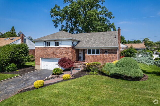 The split level homes like this one in Westbury offers plenty of space on a small footprint.