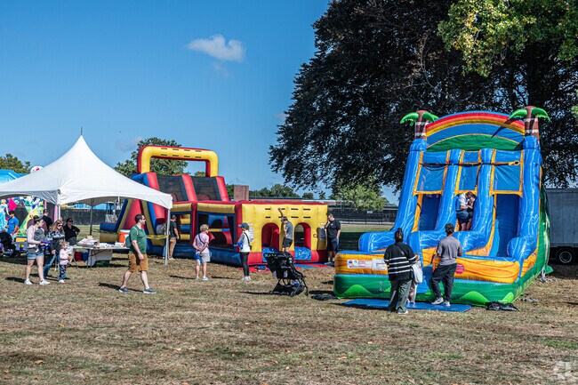 West Islip County Fair offers bounce tents for the kids.