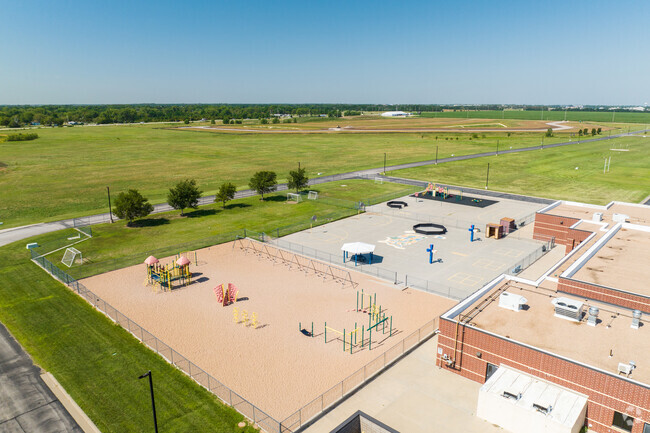 Apollo Elementary School is surrounded by a lot of open space.