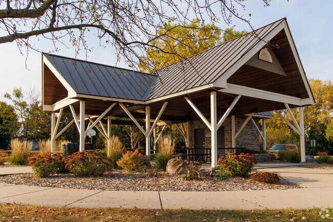 Enjoy a meal under F Buscher Park's covered seating.