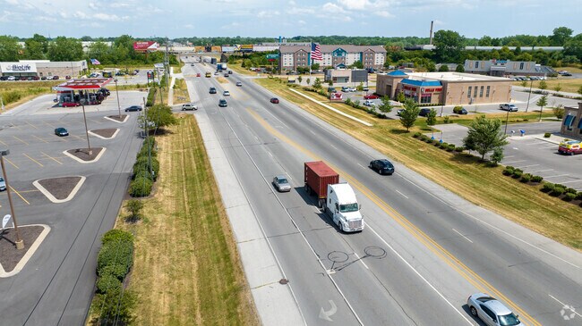 The main road connects community in s in Chapel Hill-Ben Davis, Indianapolis, IN.