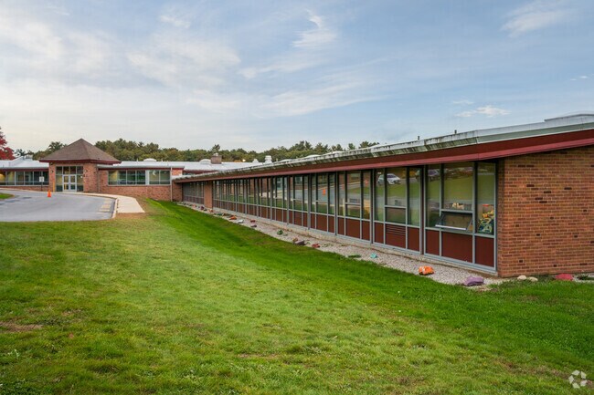 John F. Kennedy Elementary School has a 77% math proficiency score.