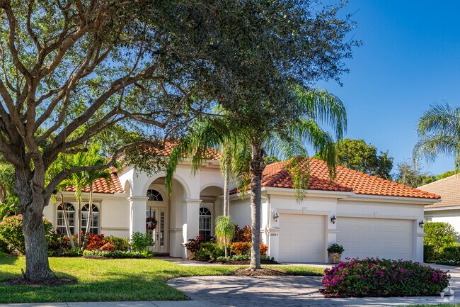 Homes in Delasol are adorned with shading trees and tropical landscaping.
