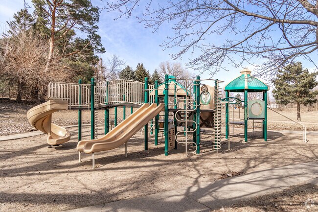 Neighborhood children enjoy the large playground at Western Hills Park.