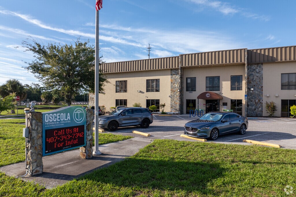 A sign displays contact information for Osceola Technical College St. Cloud.